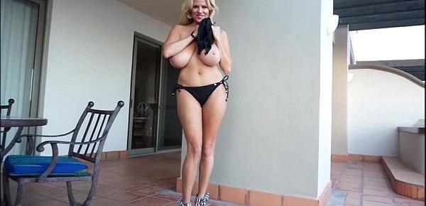  Big Tittied MILF Kelly Madison Shakes Her Juggs In A Black Bikini